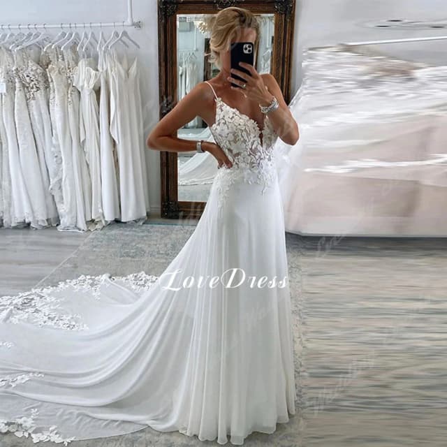 Dostosowane elegancka suknia ślubna z głębokim dekoltem w serek 2025 koronkowe aplikacje Backless suknia ślubna trapezowa bez rękawów tiul Vestido De Noiva